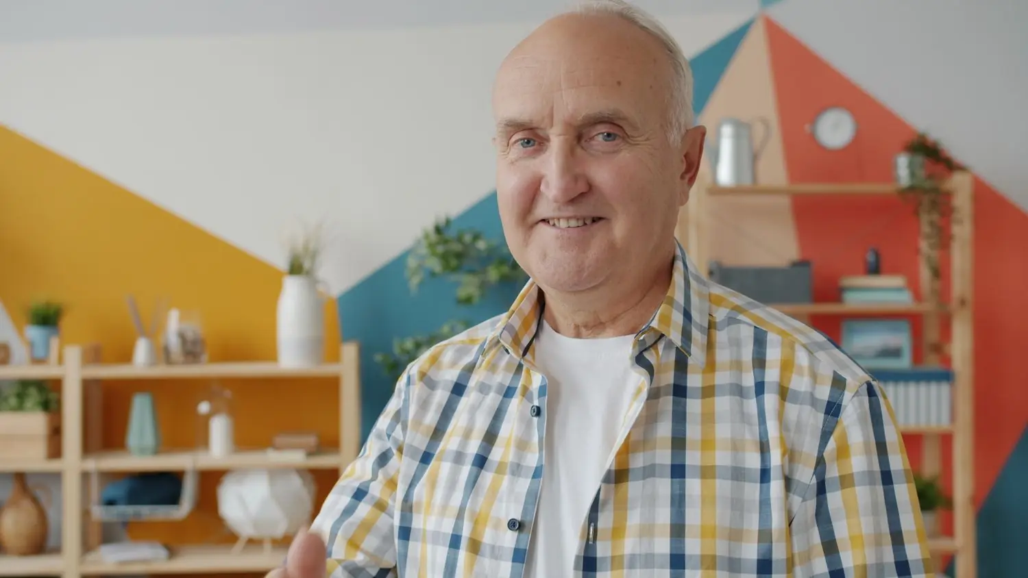 A smiling man relaxing at home